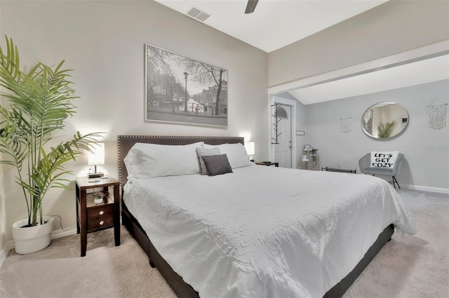 bedroom featuring ceiling fan, carpet, and vaulted ceiling