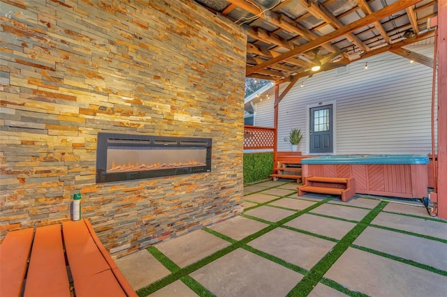 view of patio with a hot tub