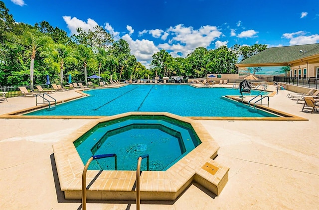 view of pool featuring a patio