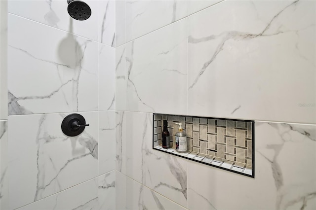 details with a tile shower