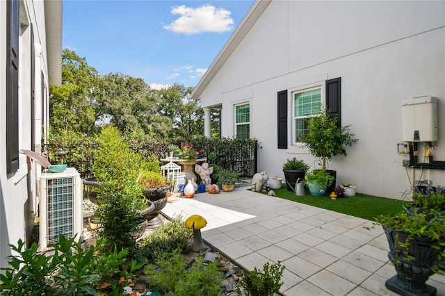 view of patio featuring cooling unit