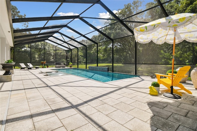 view of pool with a lanai and a patio area