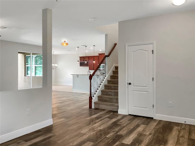 interior space with dark hardwood / wood-style floors