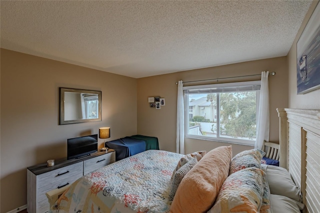 bedroom featuring a textured ceiling