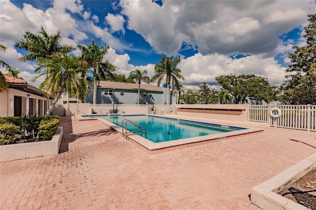 view of pool featuring a patio