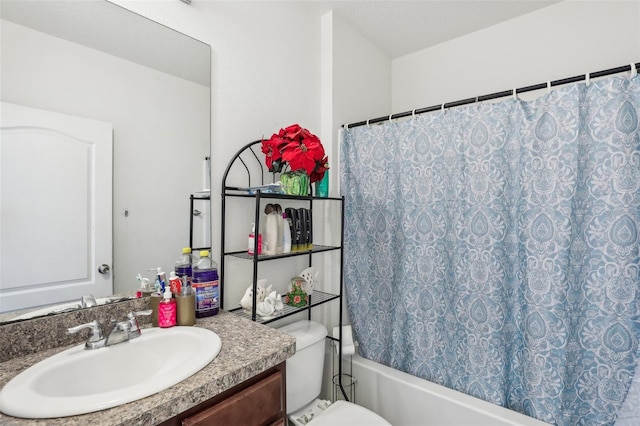 full bathroom with shower / tub combo with curtain, vanity, and toilet