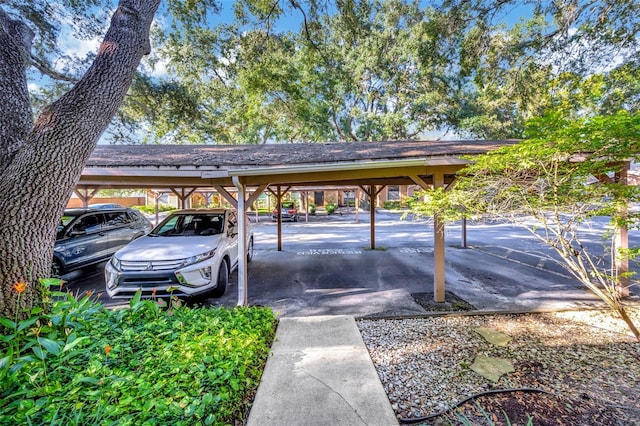 view of parking with a carport