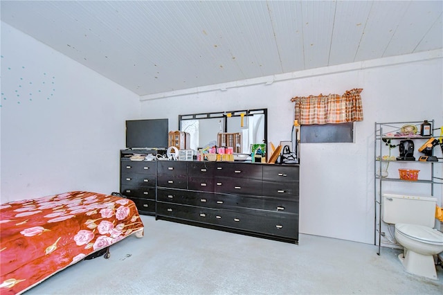 bedroom with concrete flooring