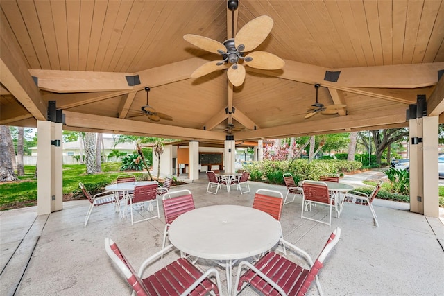 view of patio with ceiling fan and a gazebo