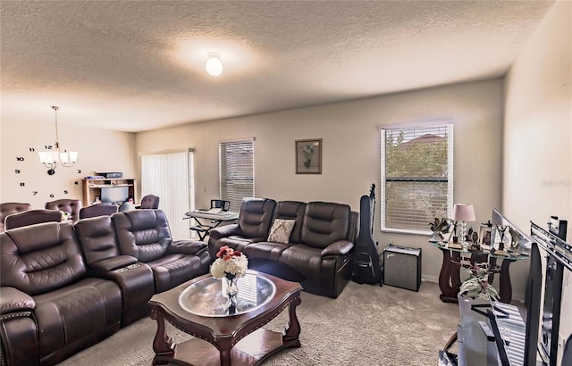 carpeted living room featuring a textured ceiling and a notable chandelier