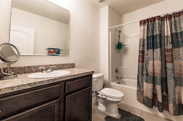 full bathroom featuring toilet, shower / bath combo with shower curtain, vanity, and tile patterned flooring