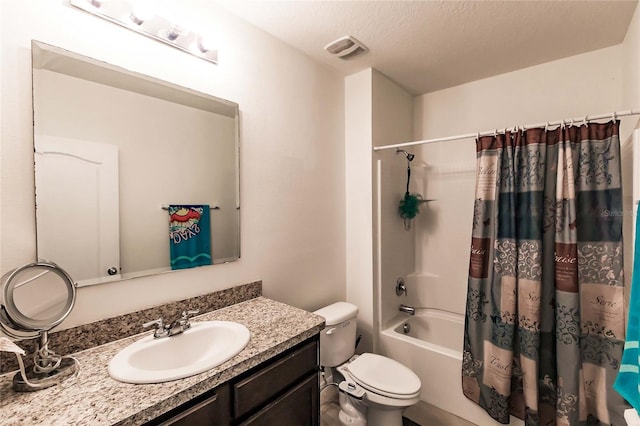 6048 Forest Ridge Ln, Winter Haven, FL 33881 - bathroom with vanity, shower / bath combination with curtain, and a textured ceiling