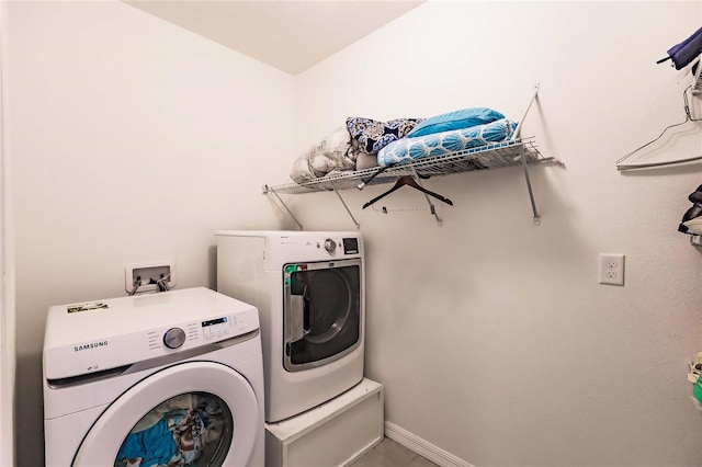 washroom featuring separate washer and dryer