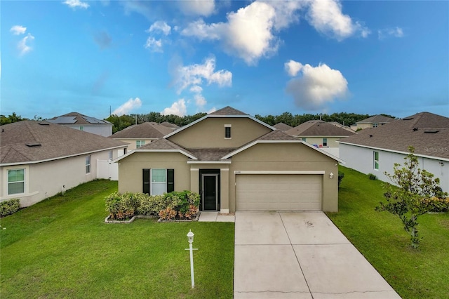 ranch-style house featuring a garage and a front lawn