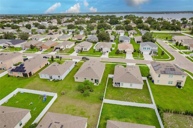 bird's eye view with a water view