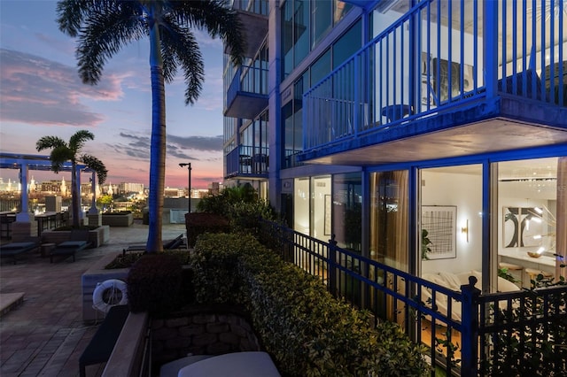 exterior space featuring a patio and a balcony