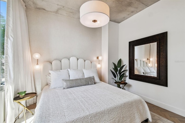 bedroom featuring parquet floors