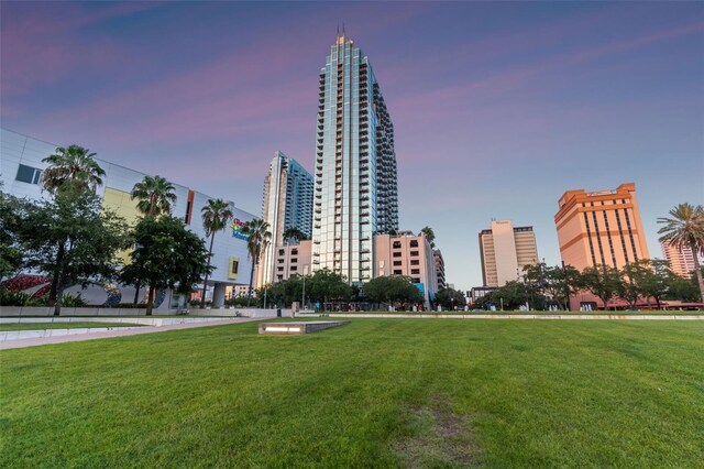 surrounding community featuring a yard