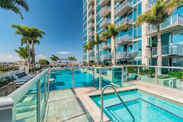 view of swimming pool with a patio