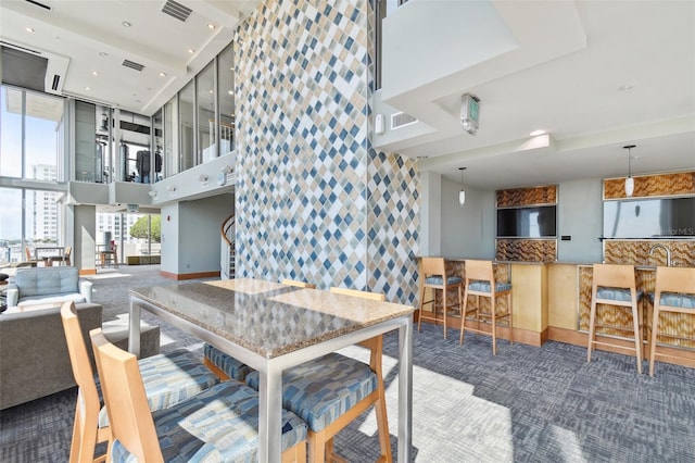 view of carpeted dining space