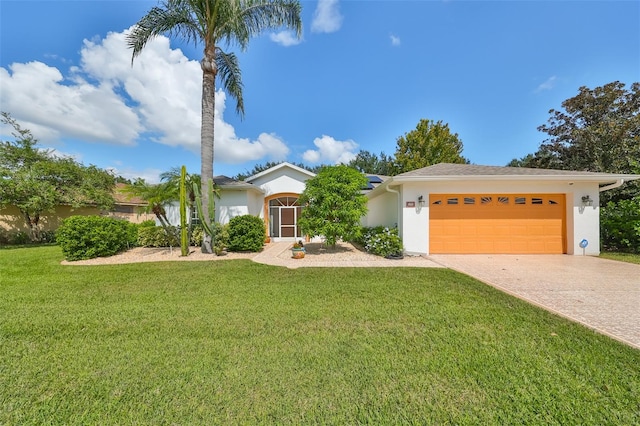 ranch-style home featuring a front yard and a garage