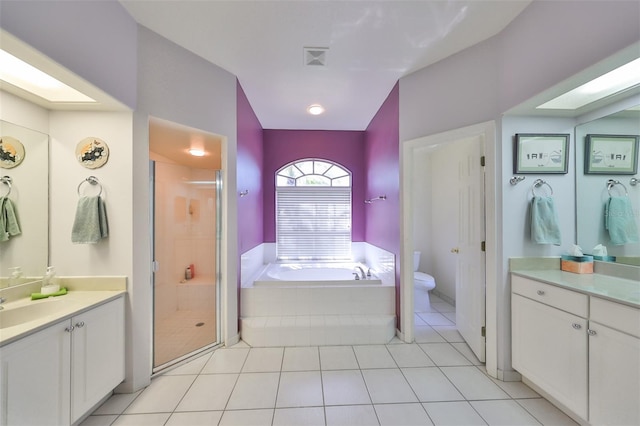 full bathroom with plus walk in shower, vanity, and toilet