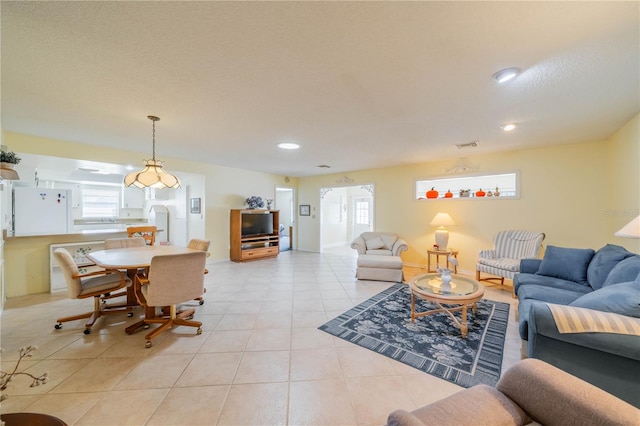 living room with light tile patterned floors