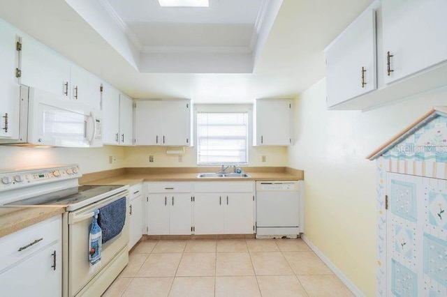 kitchen with sink, white cabinets, white appliances, light tile patterned floors, and crown molding