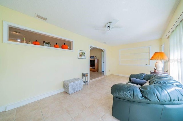 living room with ceiling fan