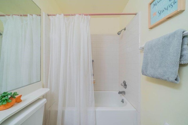 bathroom featuring shower / bath combination with curtain