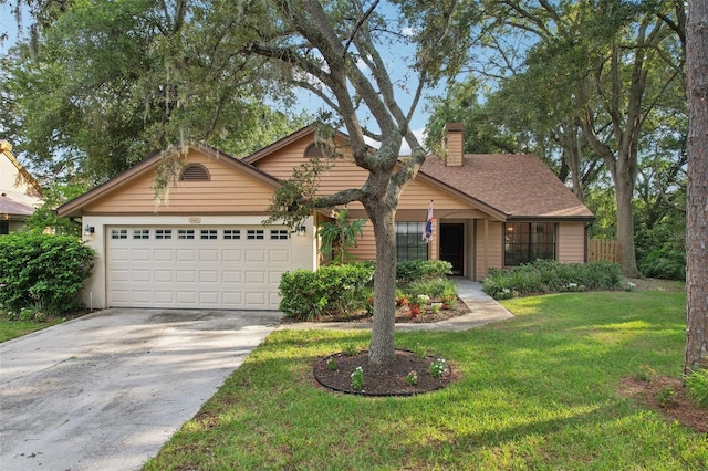 single story home featuring a front lawn and a garage