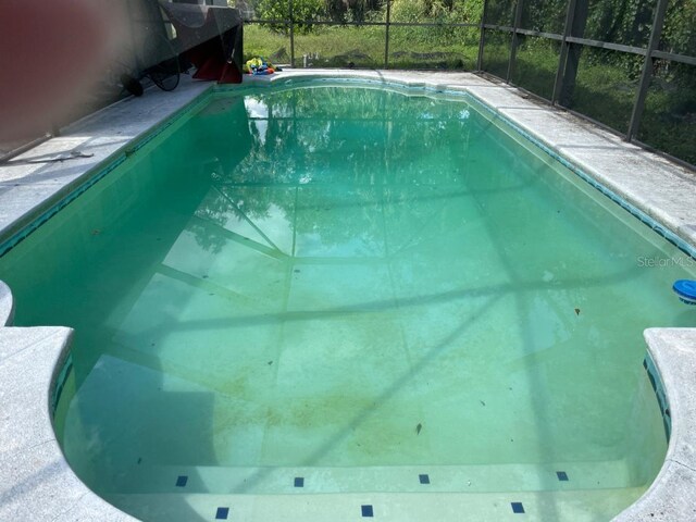 8602 Stoner Rd, Riverview, FL 33569 - pool with glass enclosure