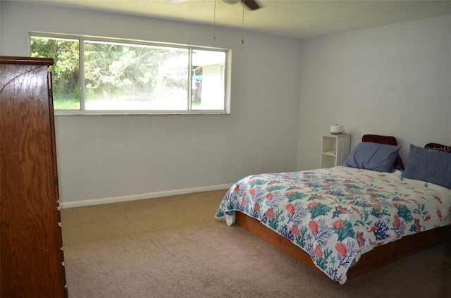 bedroom with carpet flooring and ceiling fan