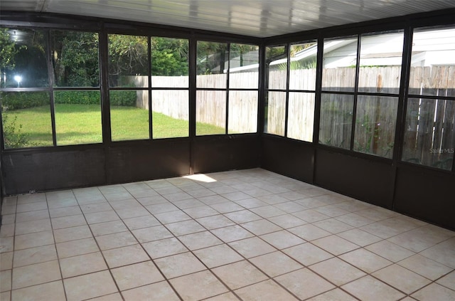 unfurnished sunroom with a healthy amount of sunlight