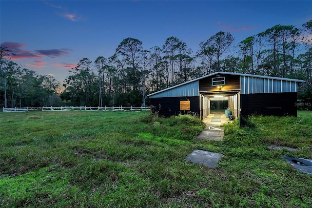 view of outdoor structure at dusk