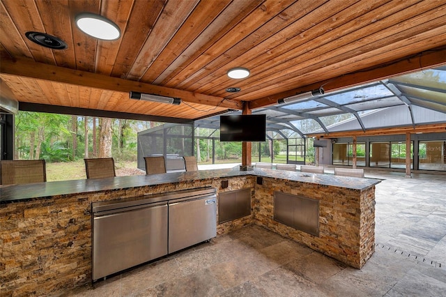 view of patio / terrace with glass enclosure