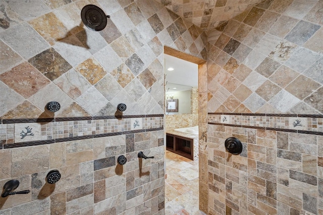 bathroom featuring a tile shower