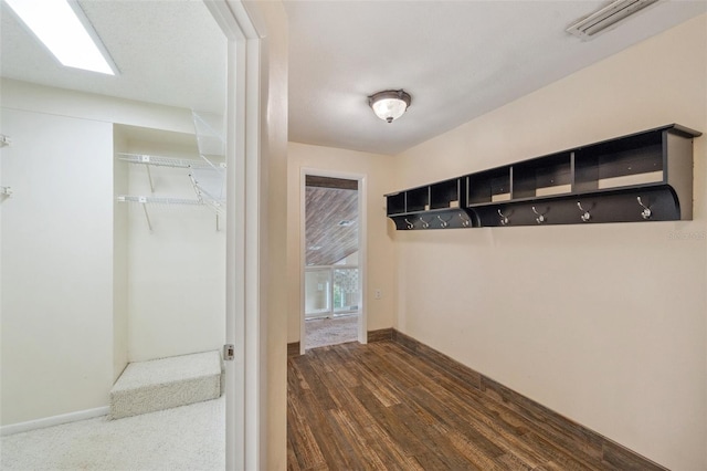 mudroom with dark wood-type flooring