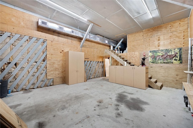 garage with wood walls