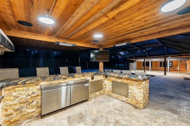 view of patio / terrace with a lanai