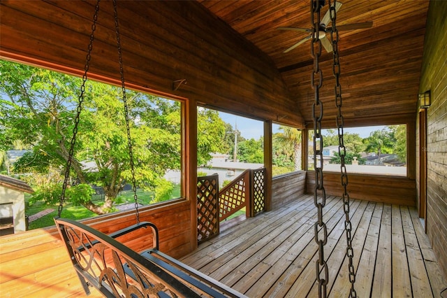 wooden terrace featuring ceiling fan