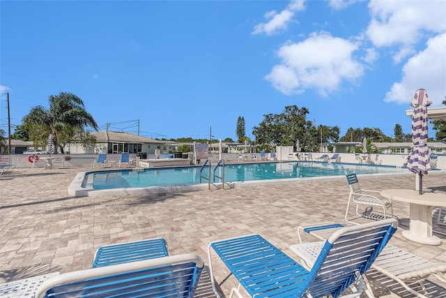 view of pool featuring a patio area