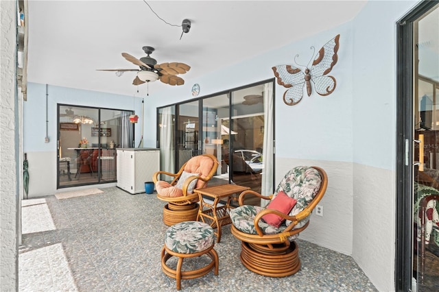 interior space featuring ceiling fan