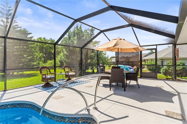 view of patio with glass enclosure