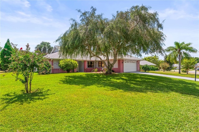 view of front facade with a front lawn and a garage