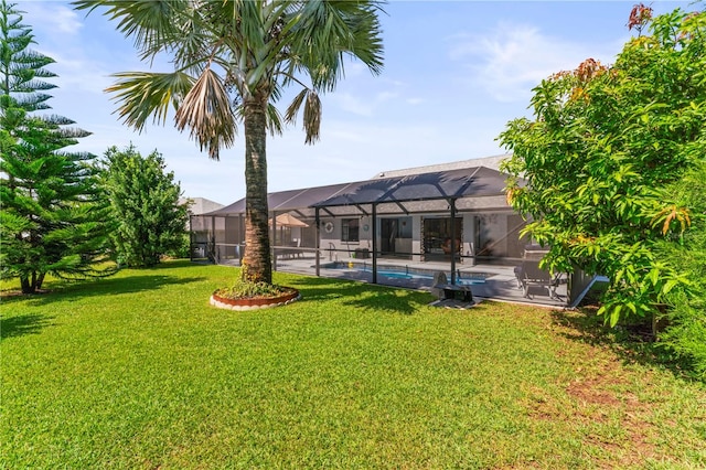 view of yard featuring glass enclosure