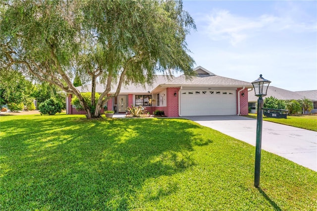 ranch-style home with a front yard and a garage