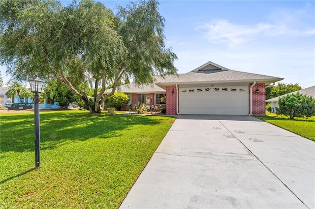 ranch-style house with a garage and a front yard