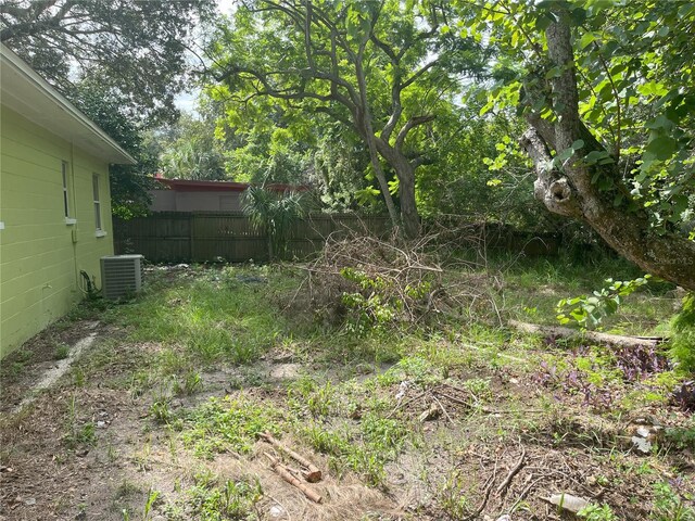 view of yard featuring central AC unit