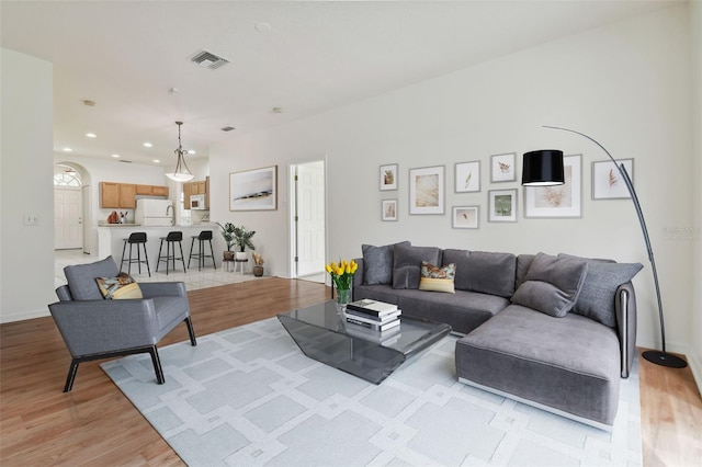 living room featuring light hardwood / wood-style flooring